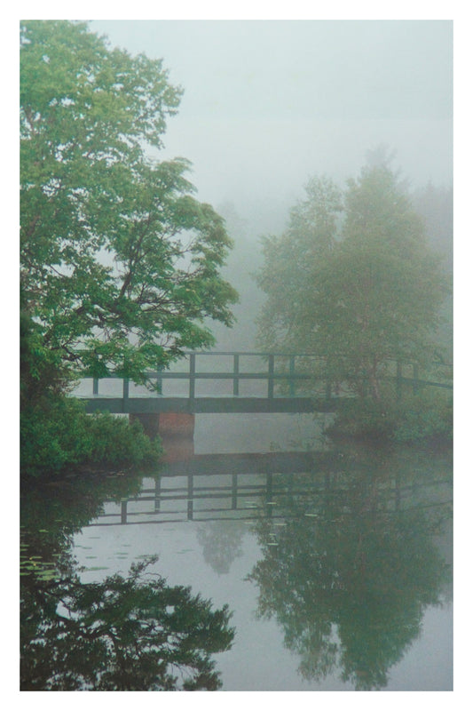 Footbridge in the Fog, Gallery Edition print: a wooden footbridge in morning fog reflected in still water, Rockwood Park, Saint John, New Brunswick